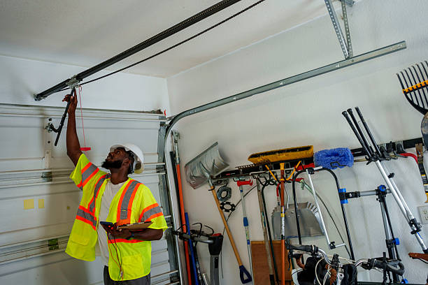 Professional Garage Door Installation technician working in Wayne County County, IL